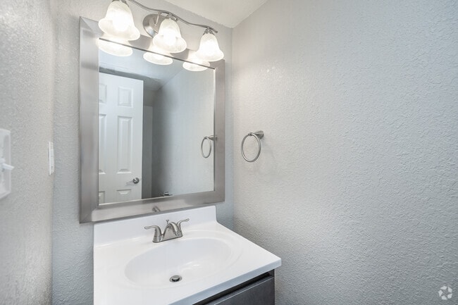 3BR, 2BA - 1,157SF - Bathroom - Harpers Square Apartments