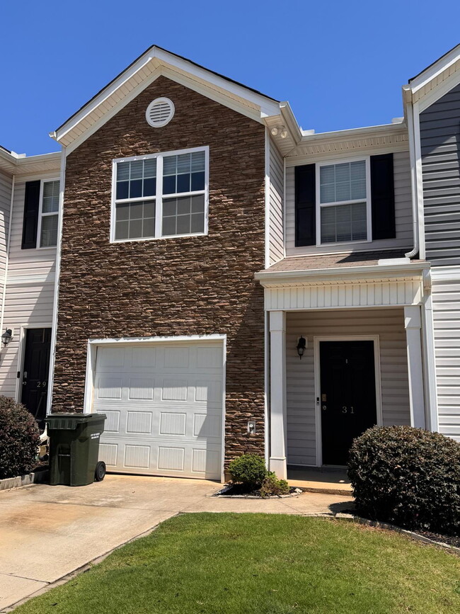 Building Photo - Modern 3-Bedroom Multiplex with 3 Full Bat... Rental
