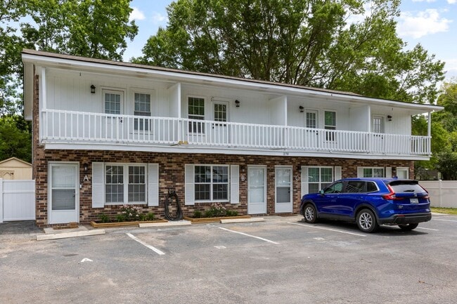 Building Photo - Available now. Water included. RENOVATED 2 BR/1.5 BA Townhouse in the Heart of James Island!