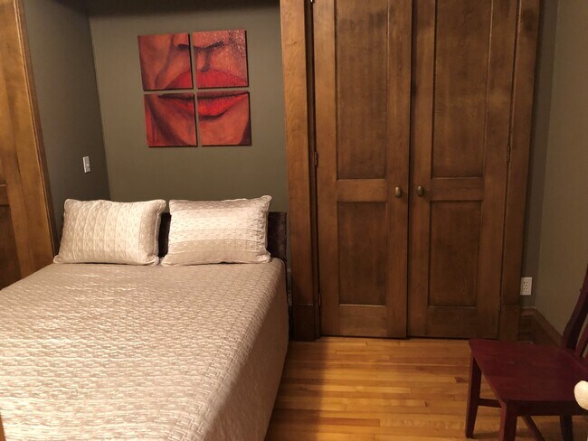 Bedroom with Murphy Bed and Closets on Each Side - 1311 Yale Pl Unit #24