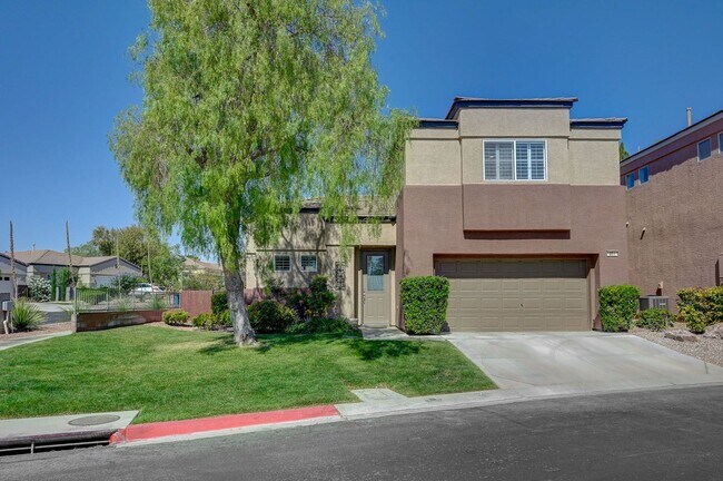 Photo - Situated on a beautifully landscaped oversized corner lot within the gated community of Desert Bl...