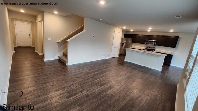Photo - "Modern Luxury: Spacious 4-Bedroom Home with Open-Concept Design"