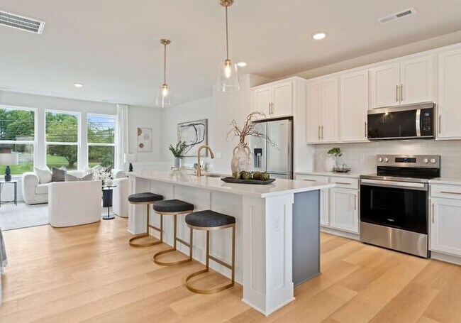 FREE RENT! Stunning 4 Bed | 3.5 Bath Luxury Townhome at The Towns at Rocky River