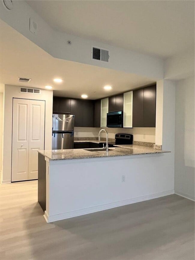 Building Photo - 5563 Millennia Park Dr