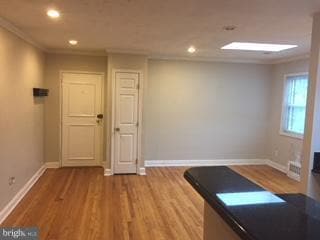 Building Photo - 7219 Flower Ave Unit 7