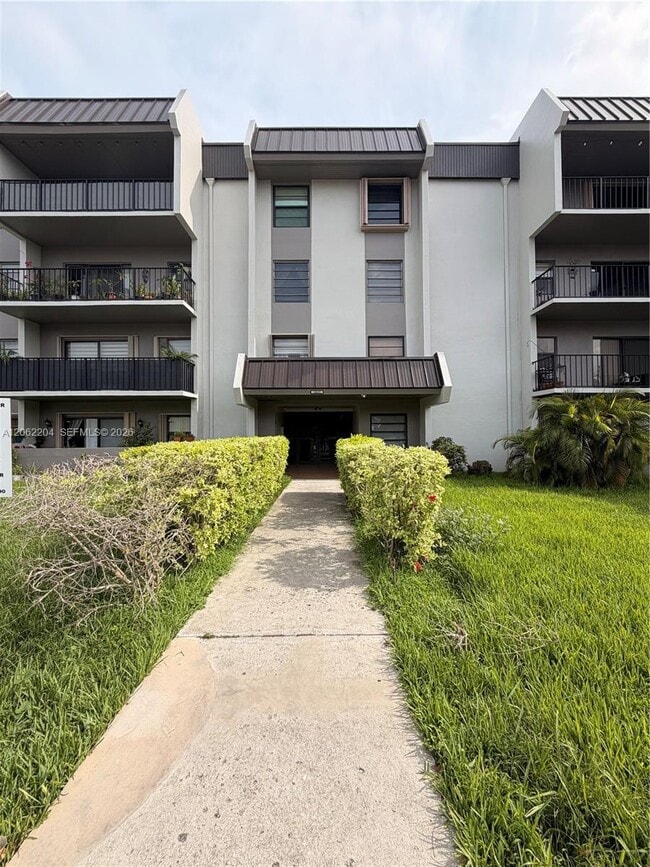 Building Photo - 10431 N Kendall Dr Unit D314