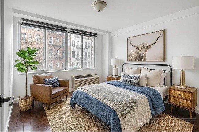 Photo - 2 Bed Home with large Living Space – Laundry, Roof Decks, Pet Friendly Unit 4A