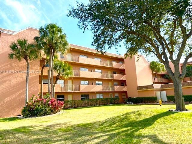 Building Photo - 3110 N Pine Island Rd Unit 108