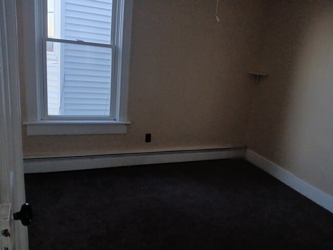 Habitación con cama lateral - 139 N Clinton St Unidad Apt 2