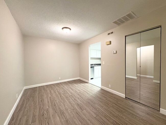 Photo - Beautiful Corner Unit with Vinyl Plank Flooring & Private Screened Patio Unit 8