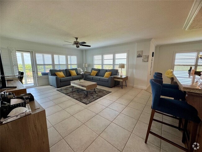 Building Photo - 10777 W Sample Rd Unit 1006 Rental