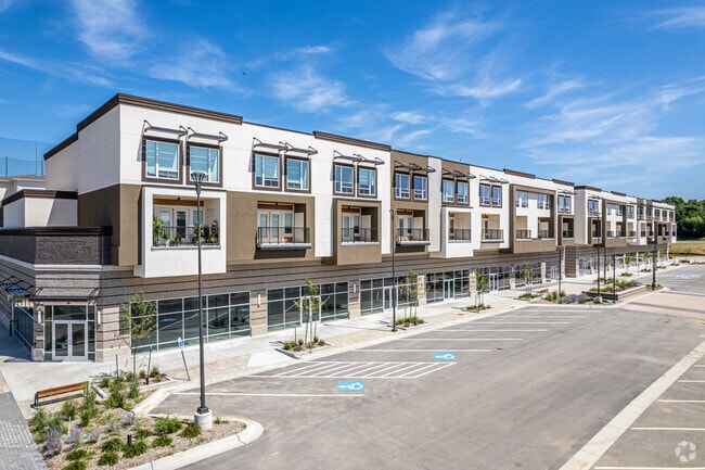 Exterior of townhome/retail space - Woodstone at Metro North Crossing