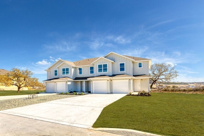 Building Photo - Stylish, Spacious & Close to It All – Your Ideal Townhome Awaits!