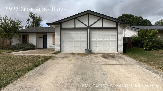 Building Photo - Three bedroom home with covered patio