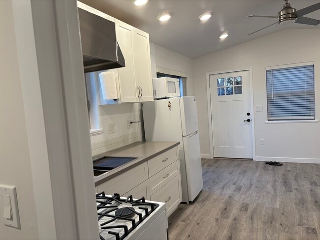kitchen + front door view - 1052 8th Ave