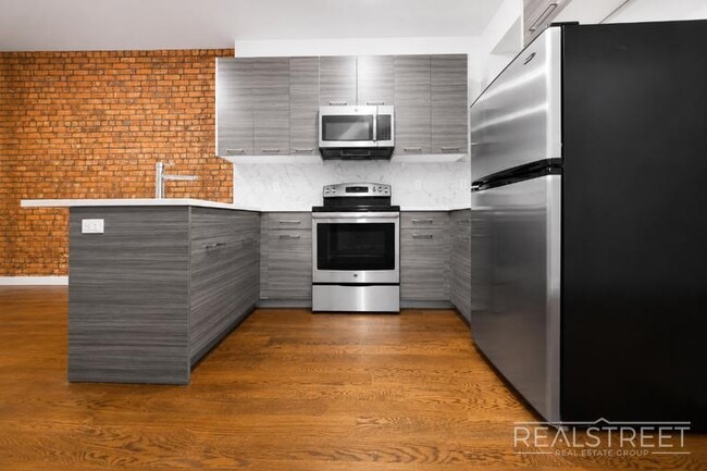 Photo - Modern 4 Bed 2 Bath Duplex with Yard in Stuyvesant Heights Unit 1L