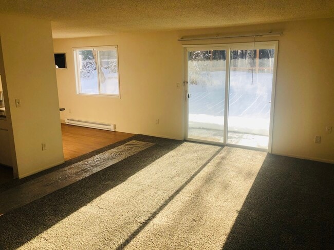 large living room, slider to patio, DR - 11308 E Mission Ave Unit 21