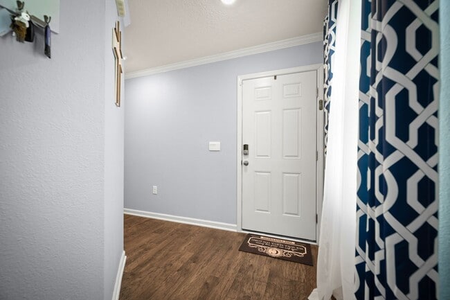 Photo - Spacious 4-Bedroom Home with Fenced Yard & Community Amenities