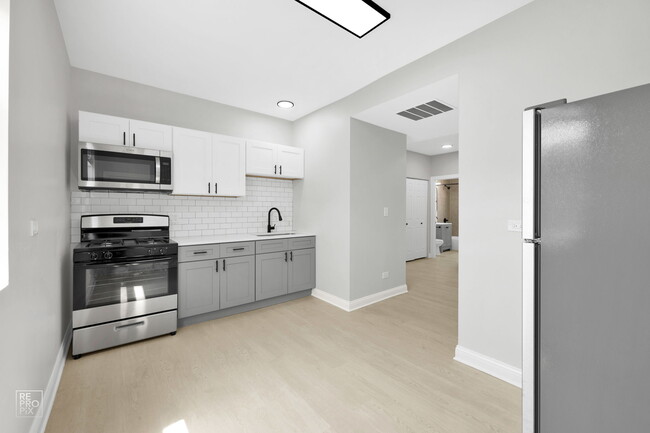 Building Photo - 310 N Menard Rental
