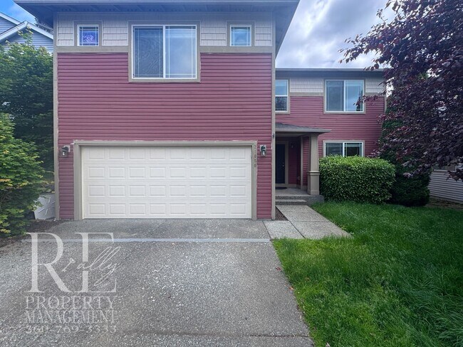 Photo - Spacious 4-Bedroom Home with Brand-New Carpet, Two Living Areas & Loft