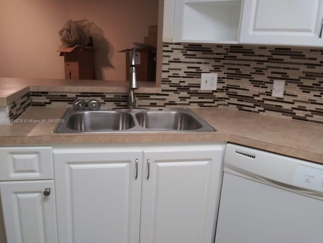 Building Photo - 6296 NW 186th St Unit 208 Rental