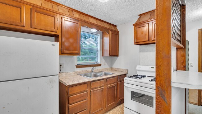 Photo - 1307 S 77th E Ave Unit Back