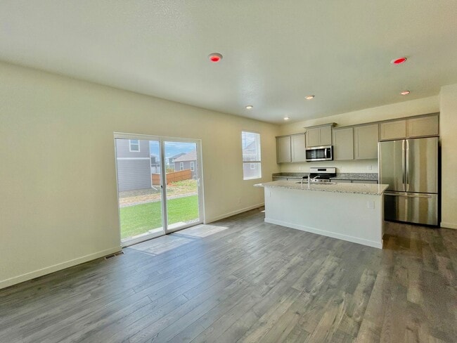 Photo - Spacious 4-Bedroom Wellington Home with 3-Car Garage, Loft & Fenced Backyard!
