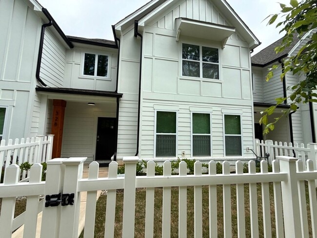 Building Photo - BRAND NEW TOWNHOME w/ Garage Parking