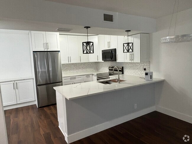Building Photo - 7690 Tahiti Ln Unit 102 Rental