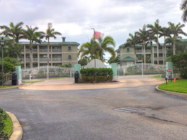 Building Photo - ANNUAL RENTAL – Spacious 3BR/2.5BA First-Floor Condo with Elevator Access in Charlotte Harbor Unit D104