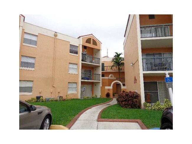 Building Photo - 6292 NW 186th St Unit 2005M Rental