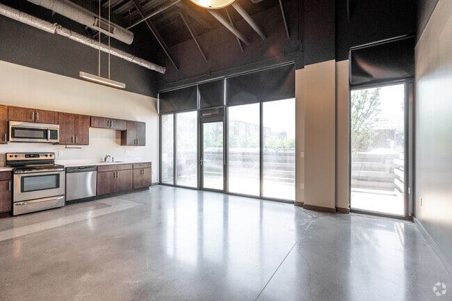 1BR, 1BA - 733 SF - Industrial - Living Room - West Glen Town Center Apartments