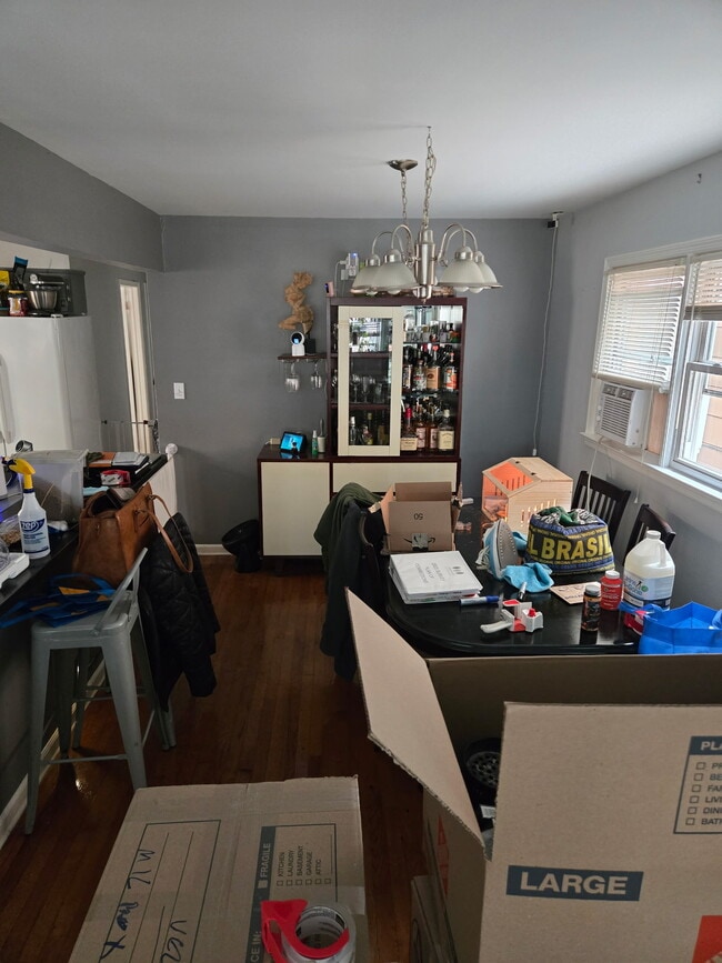 Living room facing dining room - 38 6th St Unit Private Home