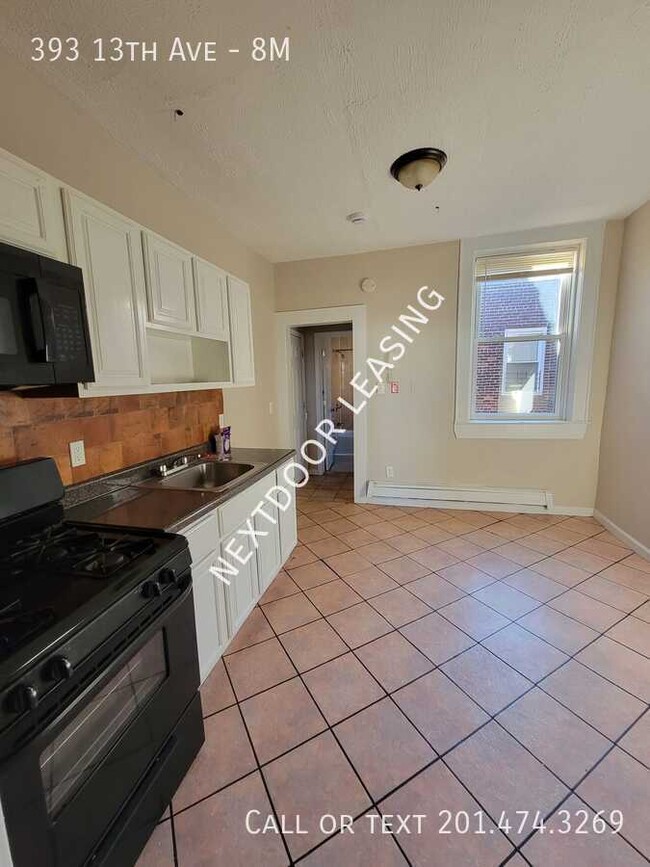 Building Photo - 393 13th Ave Unit 8M