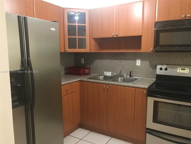 Building Photo - 6095 W 19th Ave Unit 304 Rental