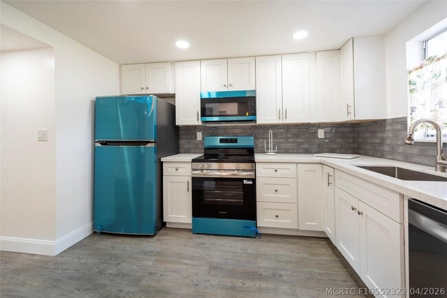 Building Photo - 6100 NW 44th St Unit 302