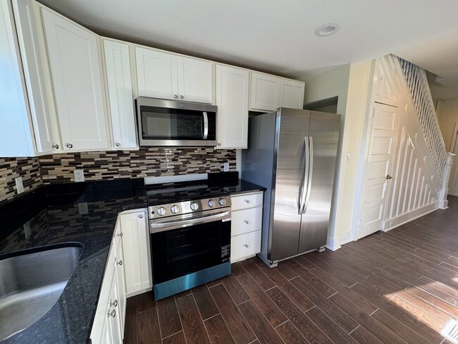 Photo - 3 bed 1.5 bath - freshly updated, central air, dishwasher, washer/dryer