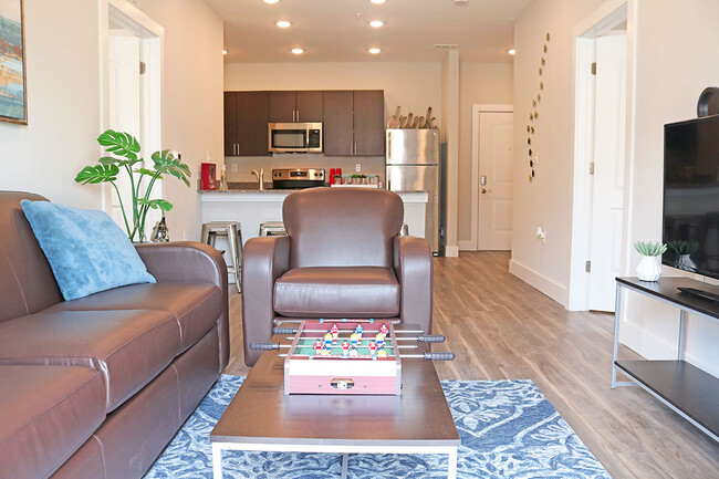 Living Room - QUARTERS BLOOMINGTON Apartments