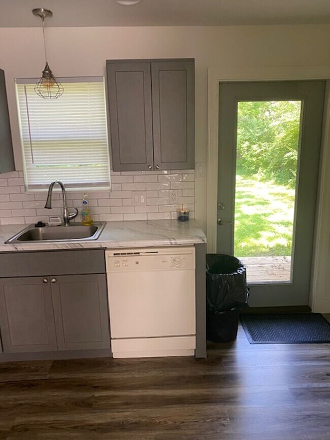 Photo - Farmhouse Finishes Near the Heartbeat of t...