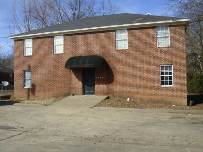 Building Photo - 110 W 5th St Unit B