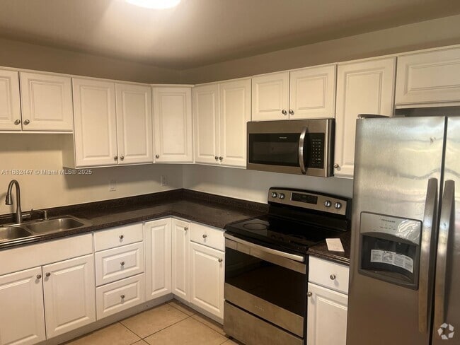 Building Photo - 8900 W Sample Rd Unit 204 Rental