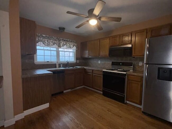 Photo - Single Family Townhouse with Garage