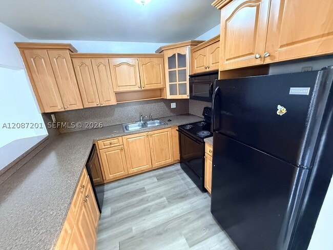 Building Photo - 6125 W 20th Ave Unit 312