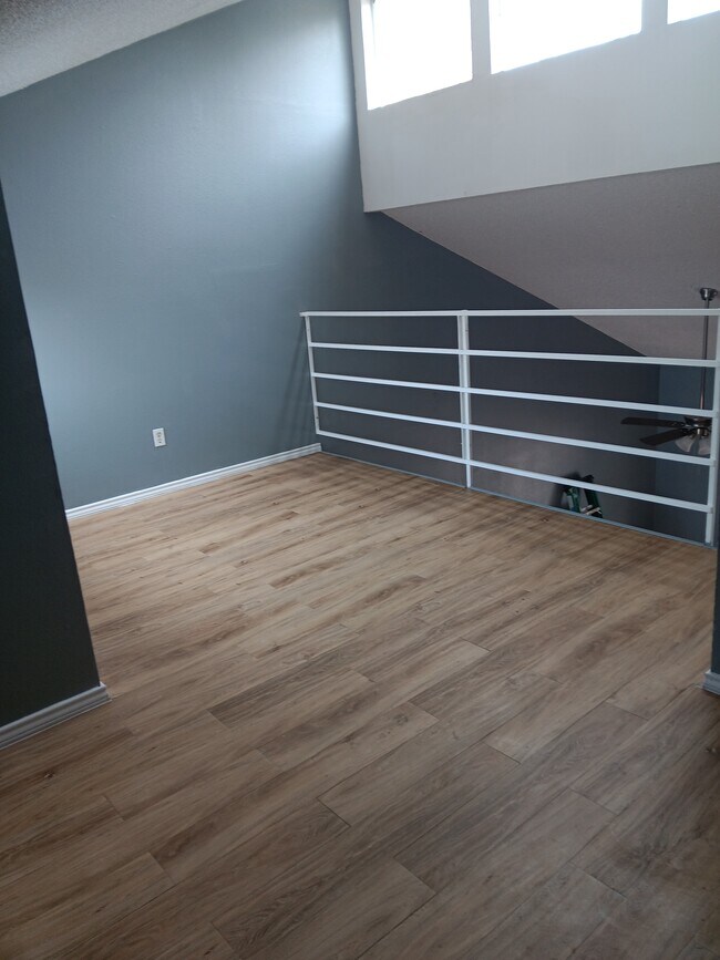 An upstairs loft which can be used as an office - 7122 Premont Dr