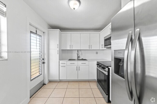 Building Photo - 14150 SW 84th St Unit 401-I Rental