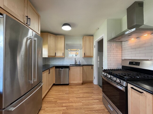 Photo - St. Johns 1940s 2Bd 1Ba home with updated Kitchen and a Basement! Features a Stained glass Outdoo...