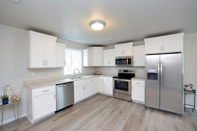 Photo - Modern 3-Bedroom Townhome with Attached Ga...