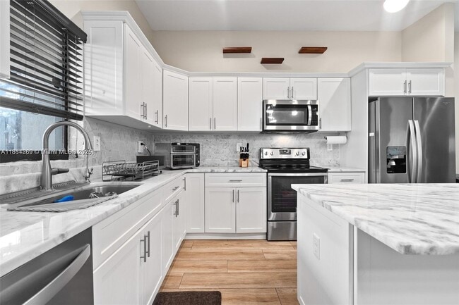 Building Photo - 9265 NW 16th St Rental