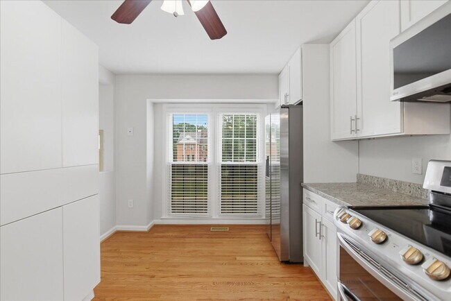 Photo - Welcome home to this beautifully updated and move-in-ready 3-bedroom, 3.5-bath townhouse