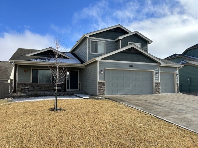 Building Photo - Spacious 5-Bedroom Home with Finished Basement and 3-Car Garage in Wellington